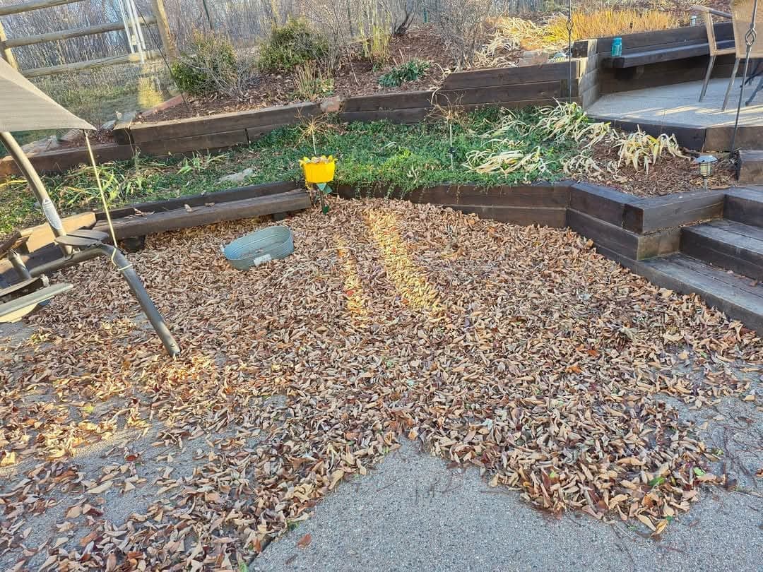 Raised garden beds in construction with gravel base and wooden frames