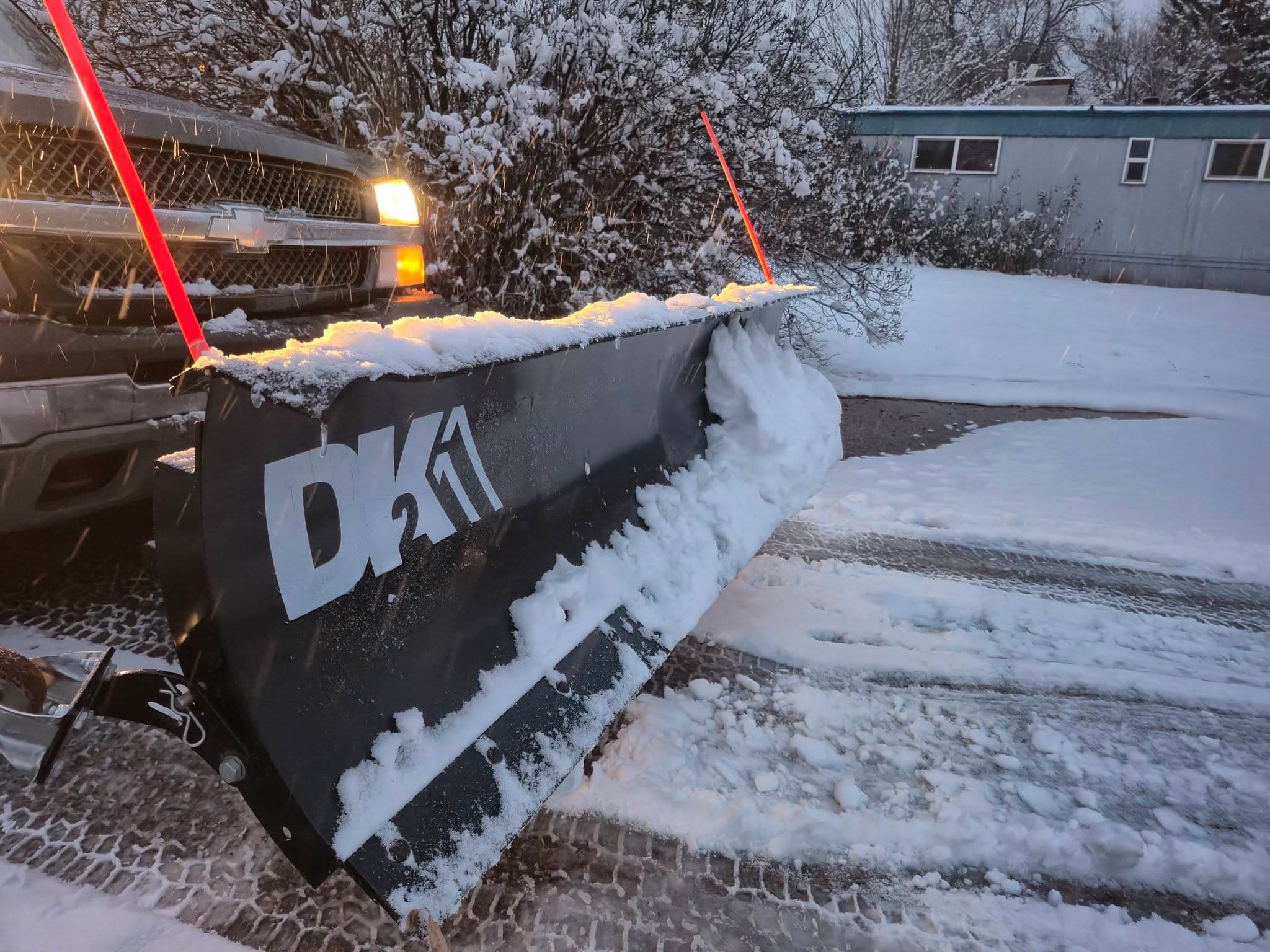 Snow plow attachment on truck